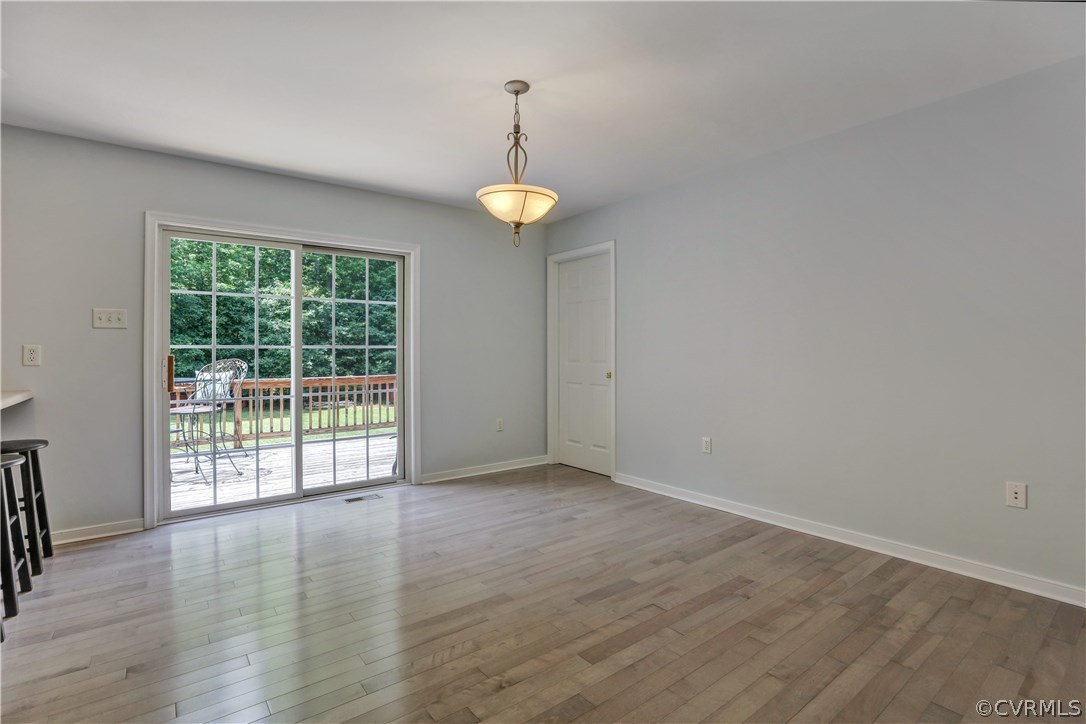 2639 Red Lane Road Powhatan, VA 23139 - Photo 8 of 30 DINING AREA WITH NEW FLOORS. NOTE THE LAUNDRY CENT