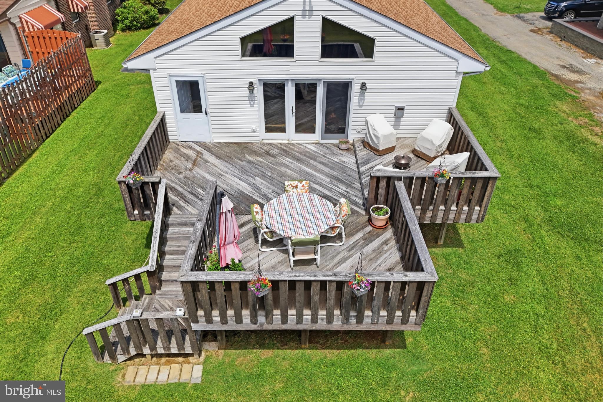1004 Green Lane Secane, PA 19018 - Photo 41 of 49 a front view of a house with garden and patio