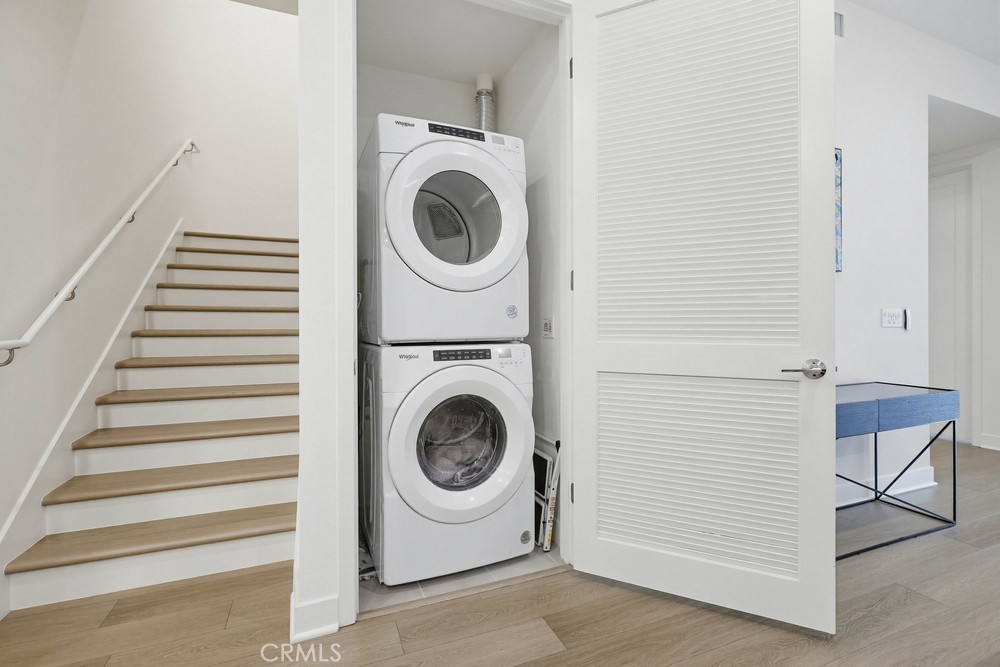 1604 Rivington Irvine, CA 92612 - Photo 31 of 75 a utility room with dryer and washer