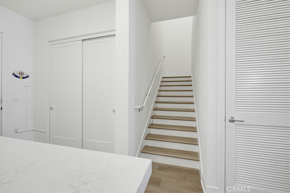 1604 Rivington Irvine, CA 92612 - Photo 32 of 75 a view of a hallway with staircase