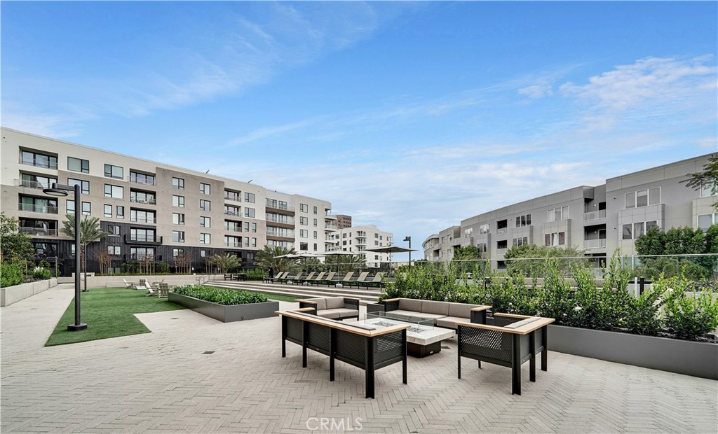 1604 Rivington Irvine, CA 92612 - Photo 71 of 75 a view of a patio with a table and chairs
