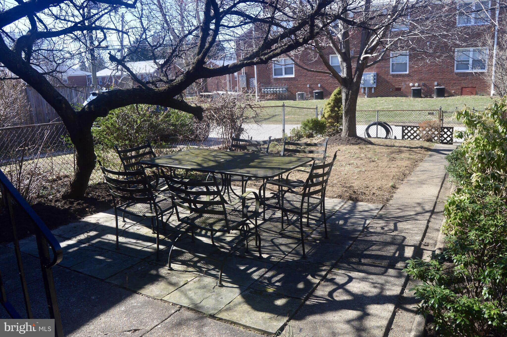 26 Murdock Road Baltimore, MD 21212 - Photo 22 of 24 a view of a yard with a tree