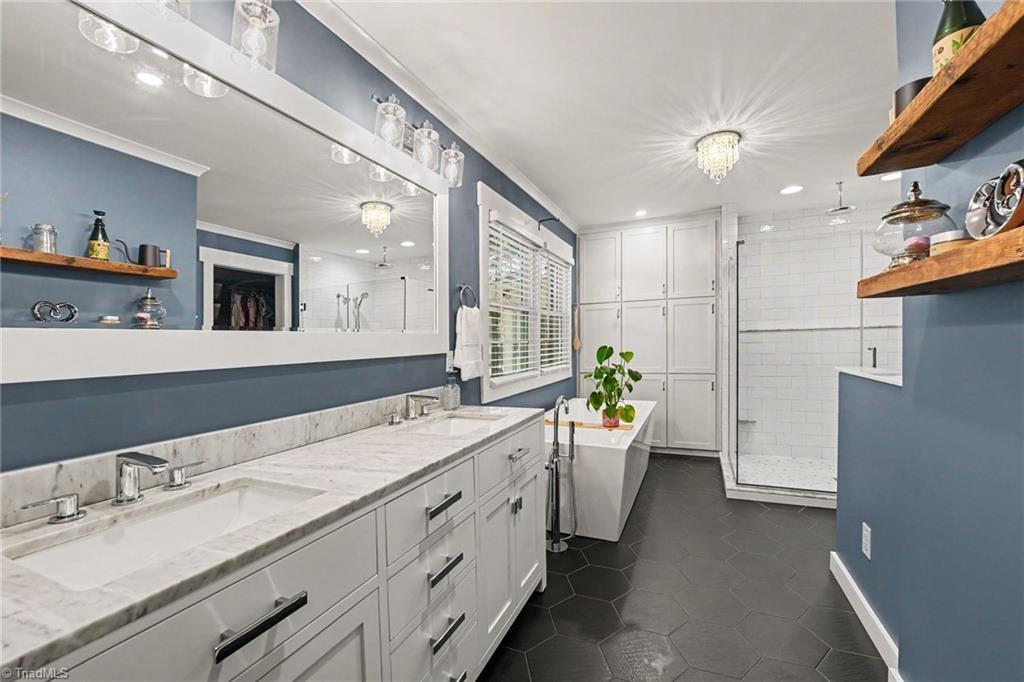 4517 Tower Road Greensboro, NC 27410 - Photo 19 of 35 Primary en suite bath