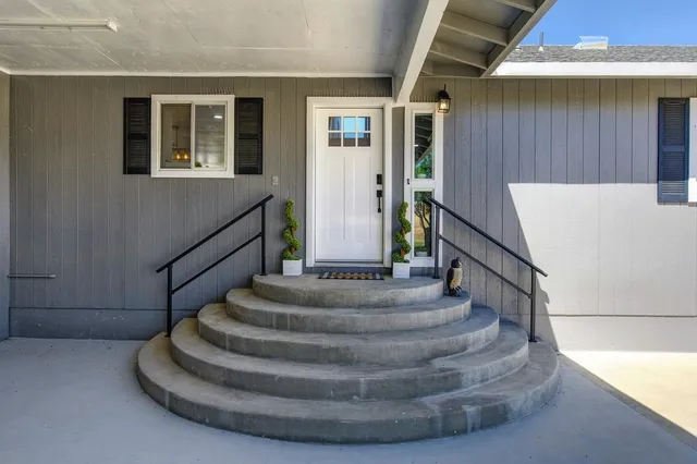 a view of a house with a big yard