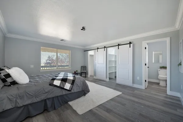 a view of entryway with wooden floor