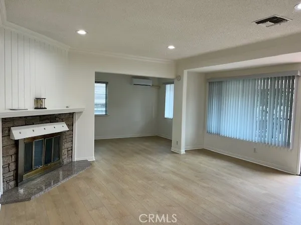 a kitchen with granite countertop a stove and a sink