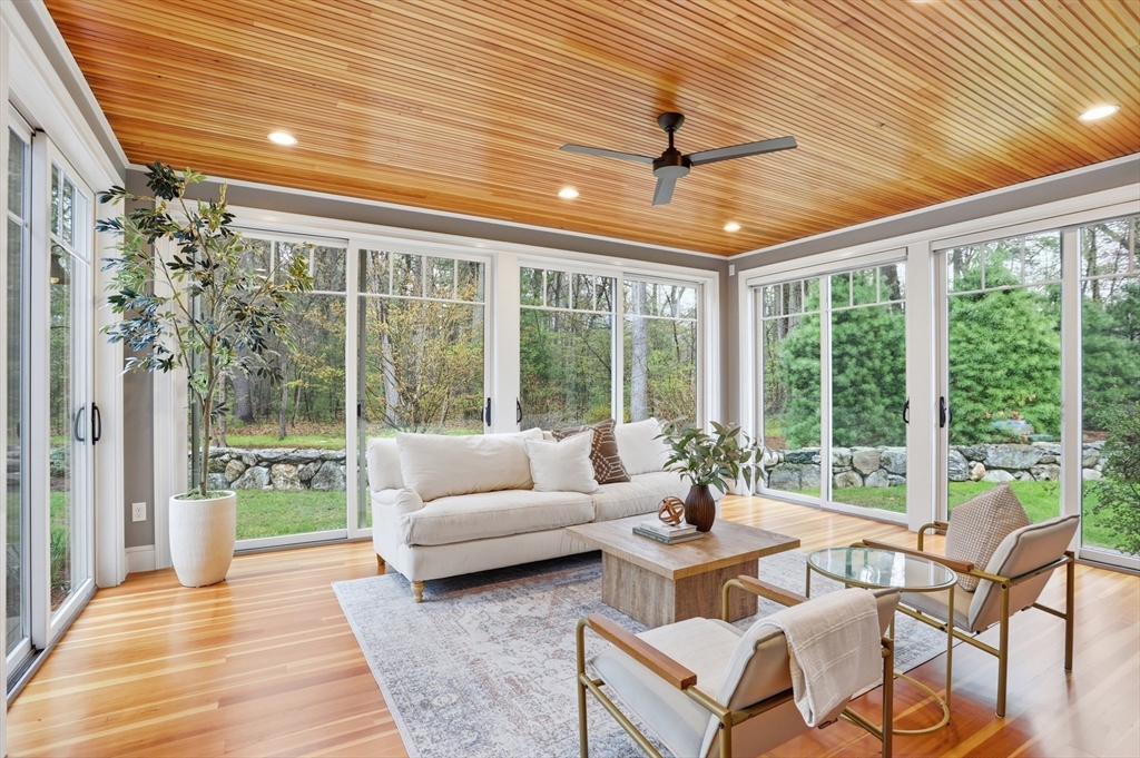 27 Maxwell Road Bedford, MA 01730 - Photo 14 of 42 a living room with furniture and a large window
