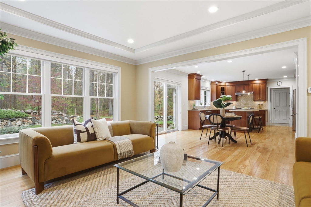 27 Maxwell Road Bedford, MA 01730 - Photo 9 of 42 a living room with furniture and a large window