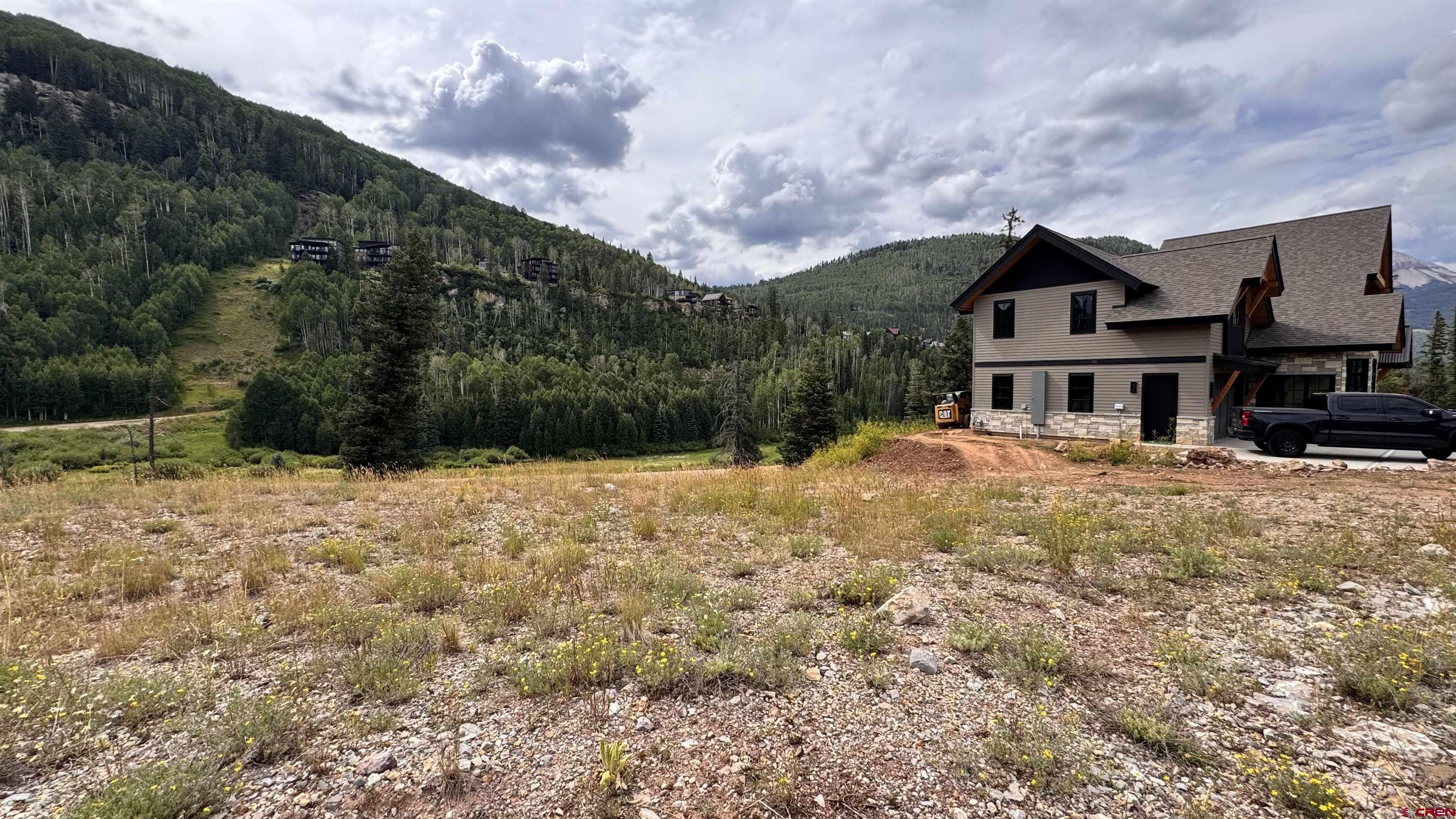 85 Vermillion Drive Durango, CO 81301 - Photo 17 of 21 a front view of a house with a yard