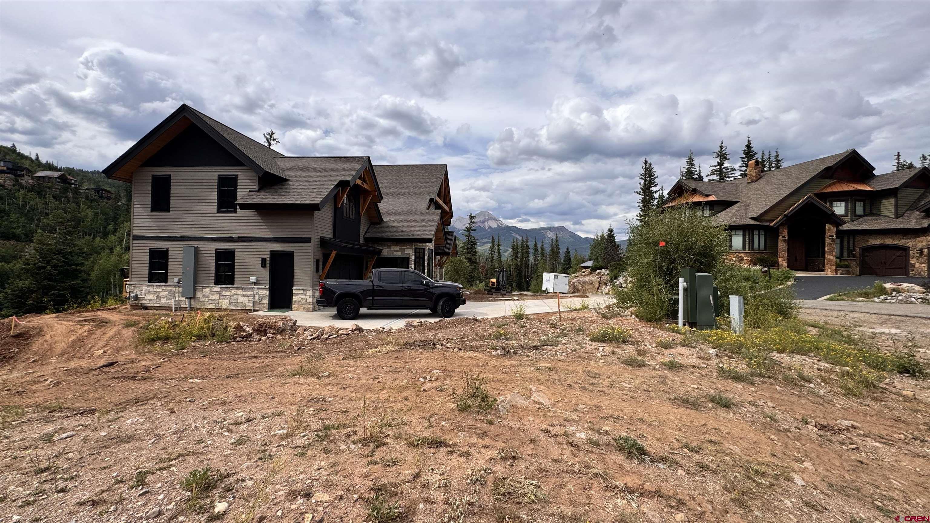 85 Vermillion Drive Durango, CO 81301 - Photo 18 of 21 a front view of a house with a yard