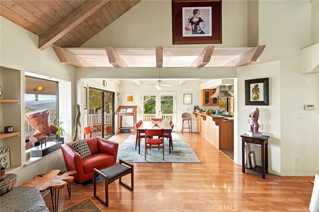 8255 Balboa Road Atascadero, CA 93422 - Photo 18 of 72 a living room with fireplace furniture and a large window