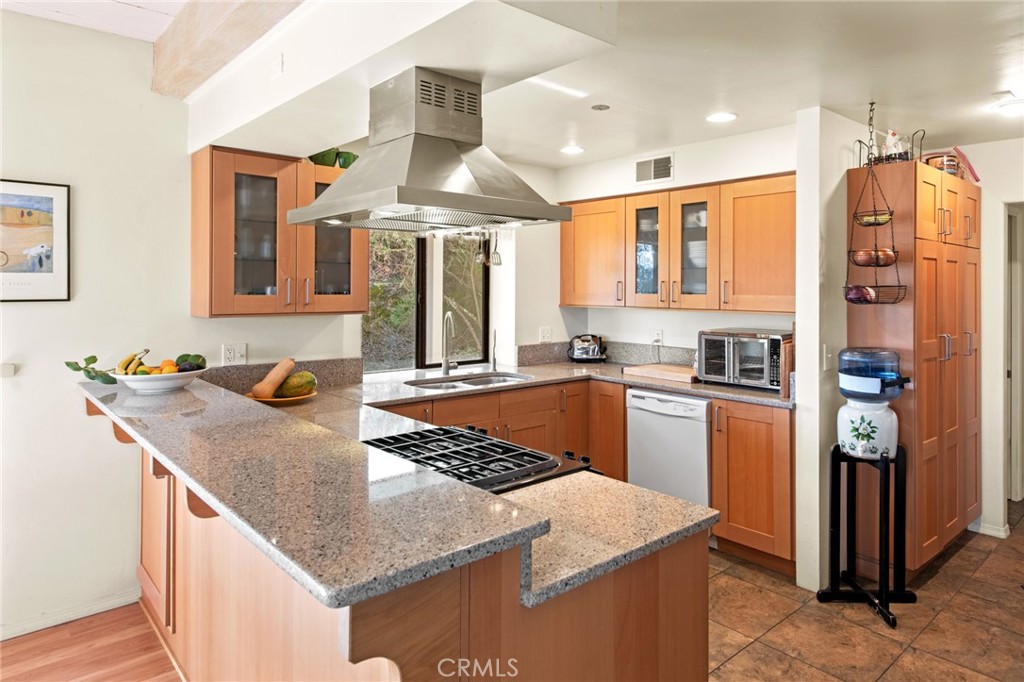 8255 Balboa Road Atascadero, CA 93422 - Photo 21 of 72 a kitchen with stainless steel appliances granite countertop a sink stove and refrigerator