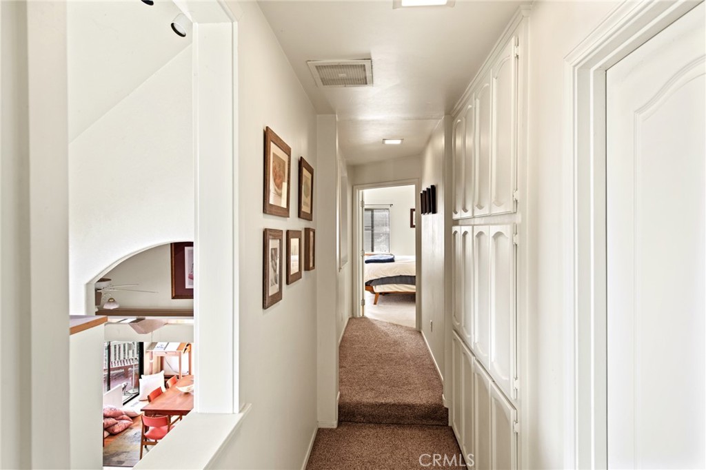 8255 Balboa Road Atascadero, CA 93422 - Photo 31 of 72 a view of a hallway with wooden floor and entryway