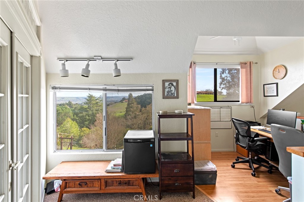 8255 Balboa Road Atascadero, CA 93422 - Photo 34 of 72 a view of a workspace with furniture and a window