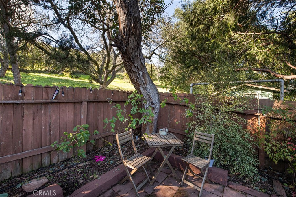 8255 Balboa Road Atascadero, CA 93422 - Photo 60 of 72 a view of backyard with seating space and trees