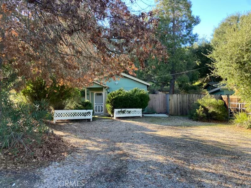 8255 Balboa Road Atascadero, CA 93422 - Photo 6 of 72 a view of a patio with table and chairs under an umbrella