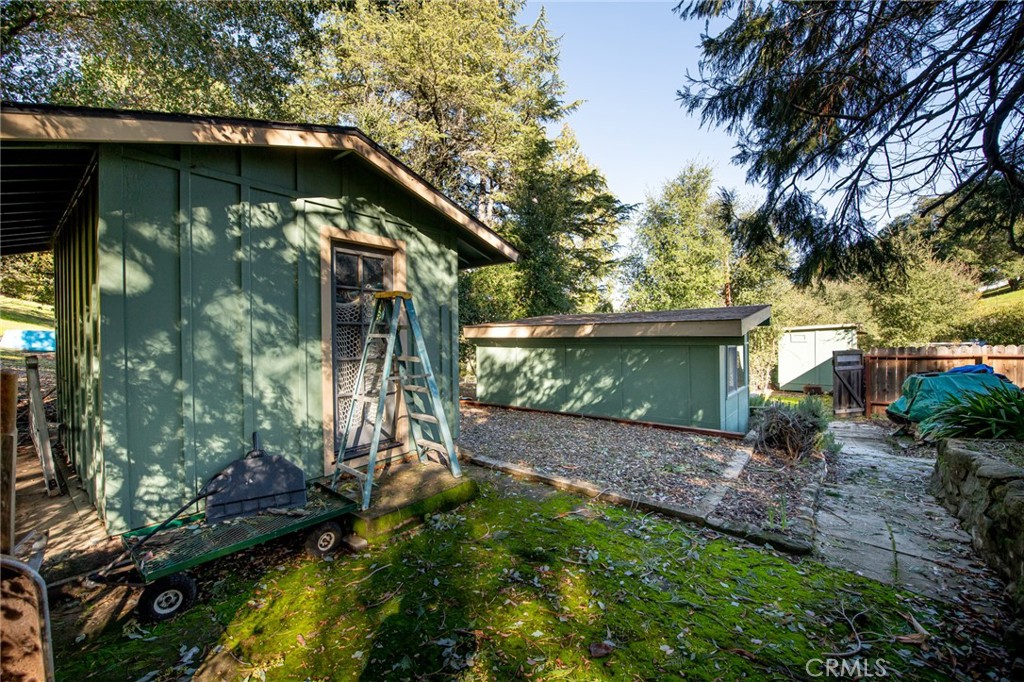 8255 Balboa Road Atascadero, CA 93422 - Photo 63 of 72 a view of a wooden house with a yard