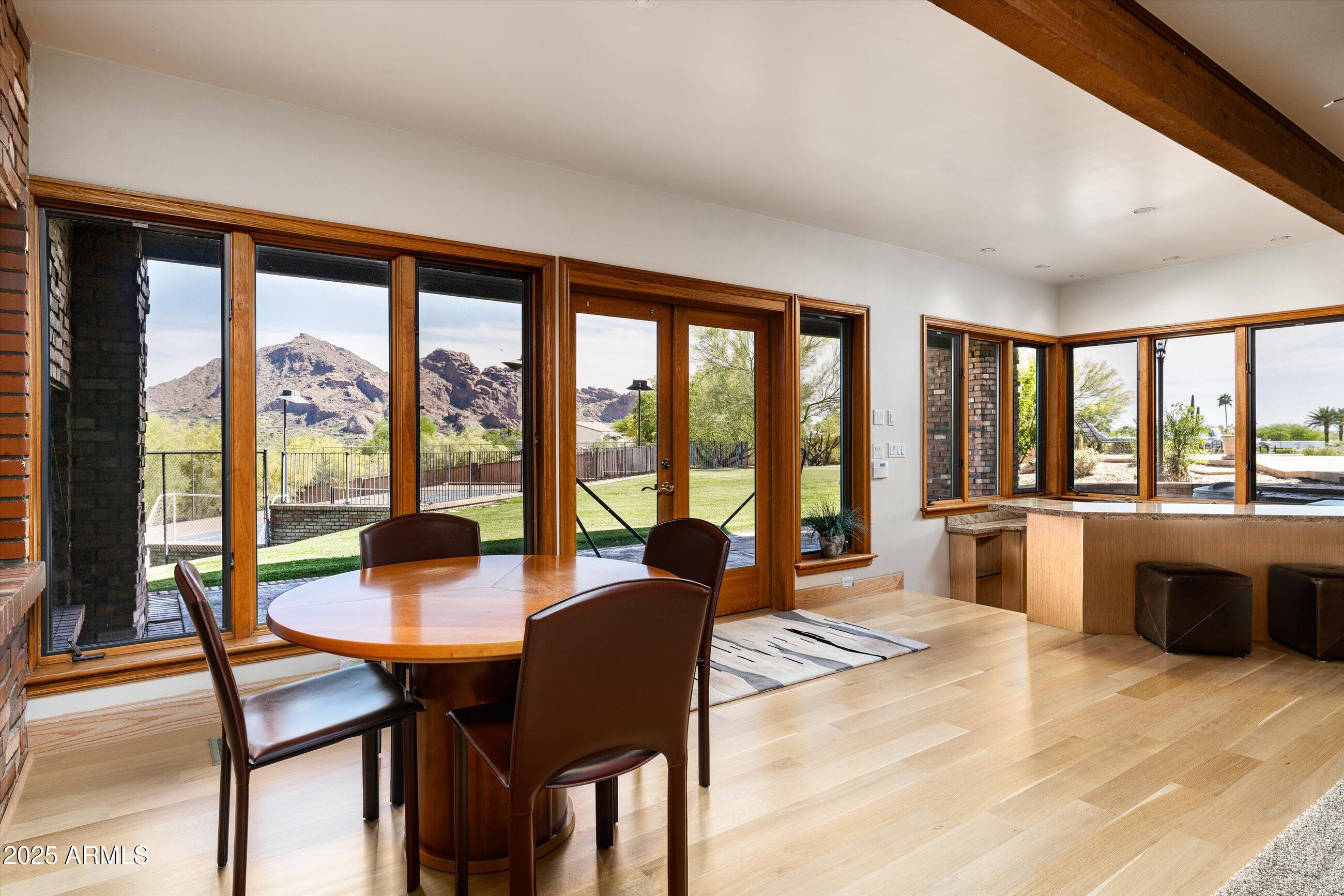 6830 North 46th Place Paradise Valley, AZ 85253 - Photo 17 of 65 a living room with furniture and floor to ceiling windows