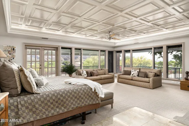 a living room with furniture gym equipment and a flat screen tv