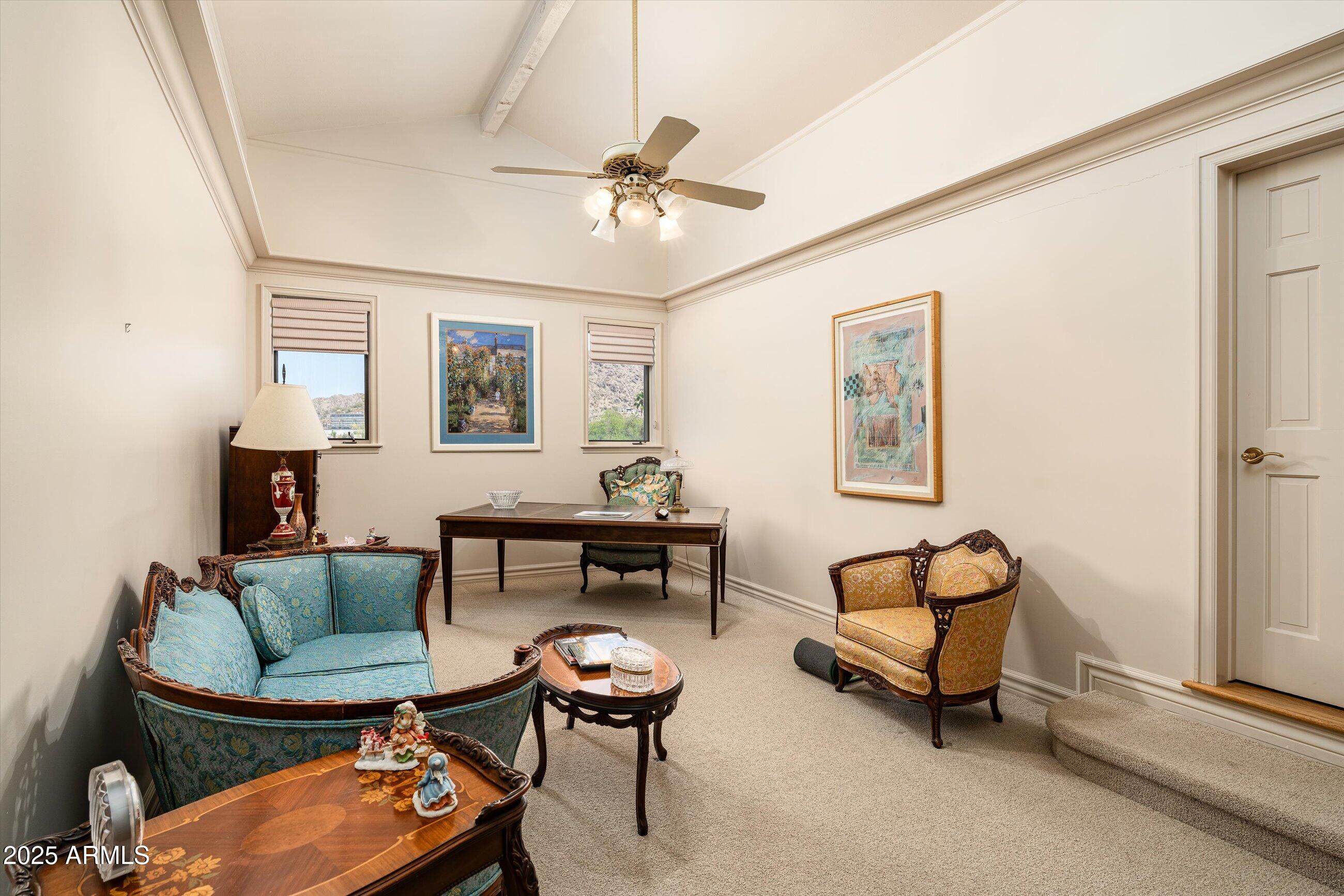 6830 North 46th Place Paradise Valley, AZ 85253 - Photo 25 of 65 a living room with furniture a air conditioner and a window