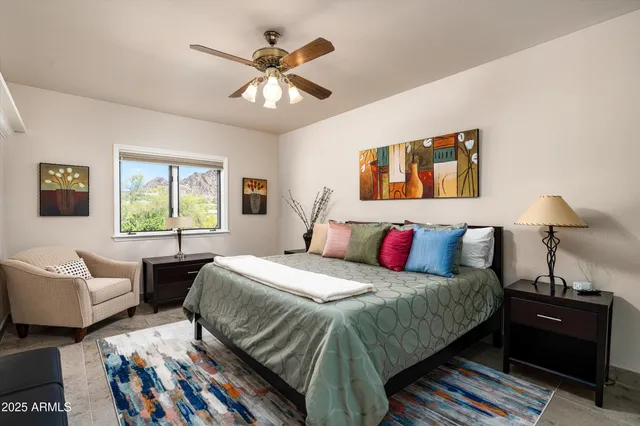 a living room with furniture and a rug