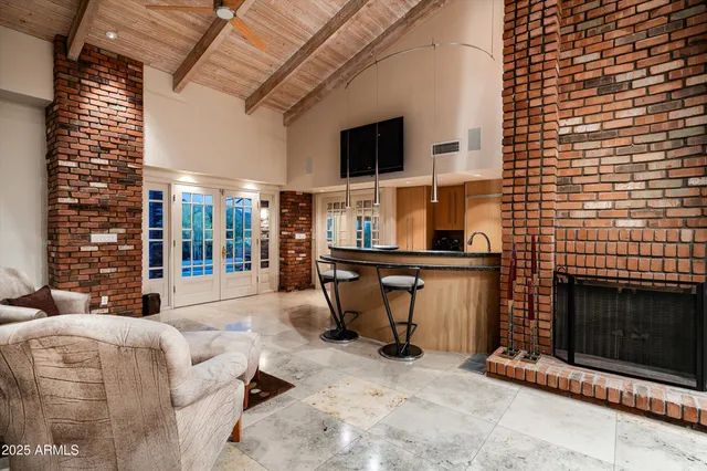 an aerial view of a house with a garden