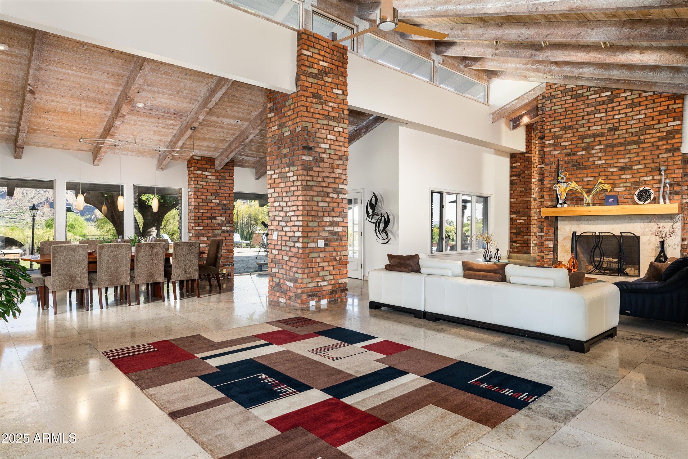 6830 North 46th Place Paradise Valley, AZ 85253 - Photo 40 of 65 a living room with furniture and a rug