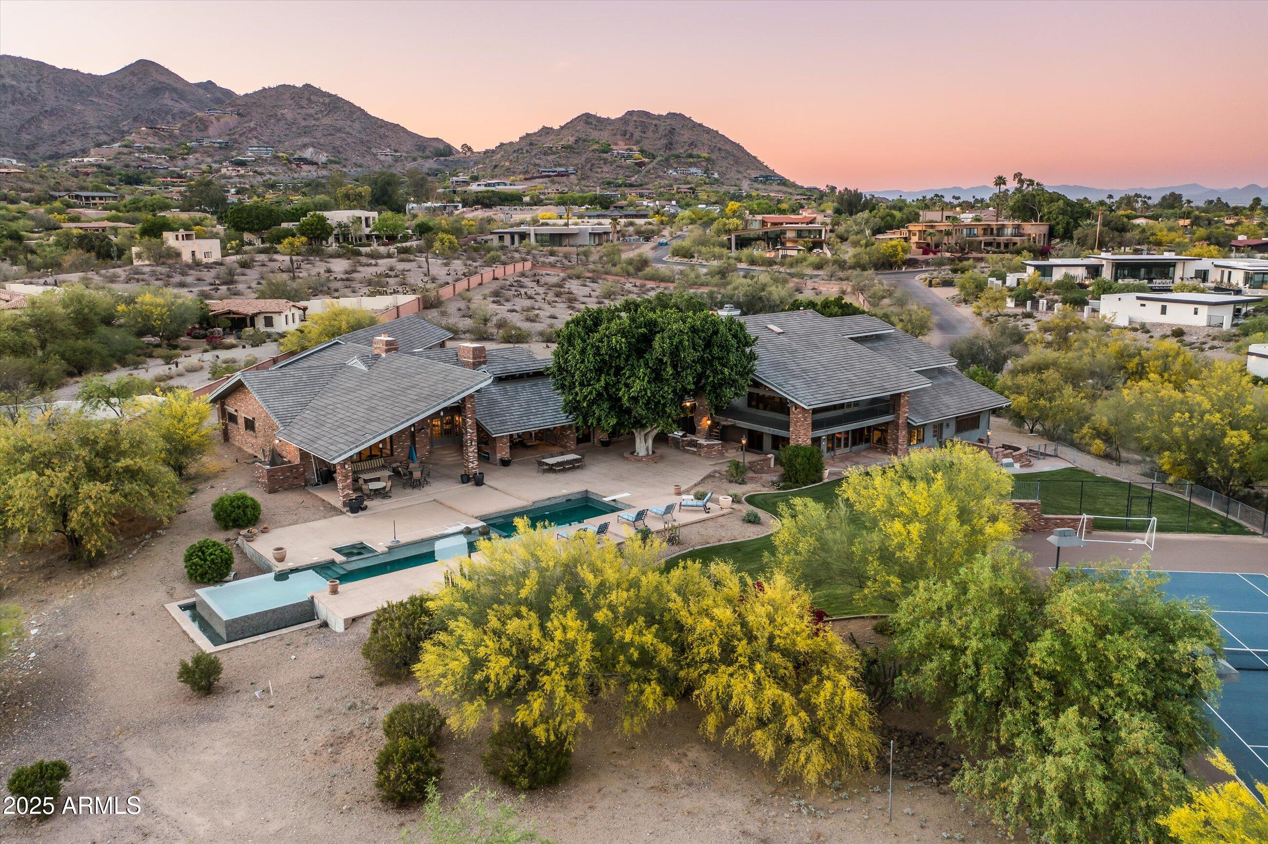 6830 North 46th Place Paradise Valley, AZ 85253 - Photo 45 of 65 an aerial view of a house with a garden