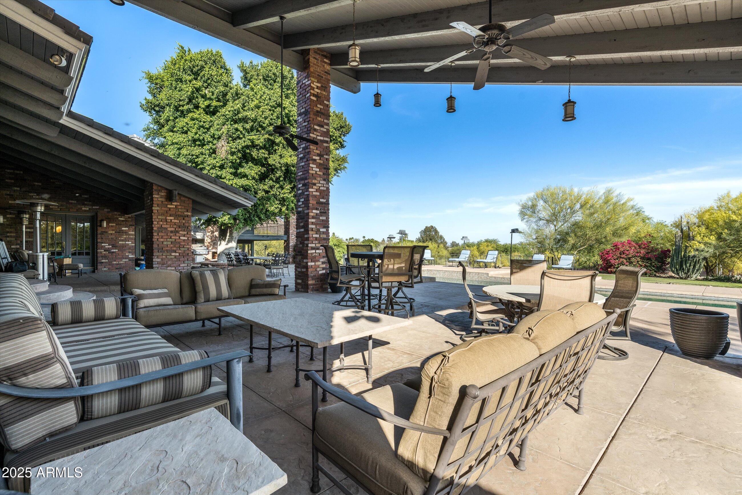 6830 North 46th Place Paradise Valley, AZ 85253 - Photo 60 of 65 a view of a terrace with furniture