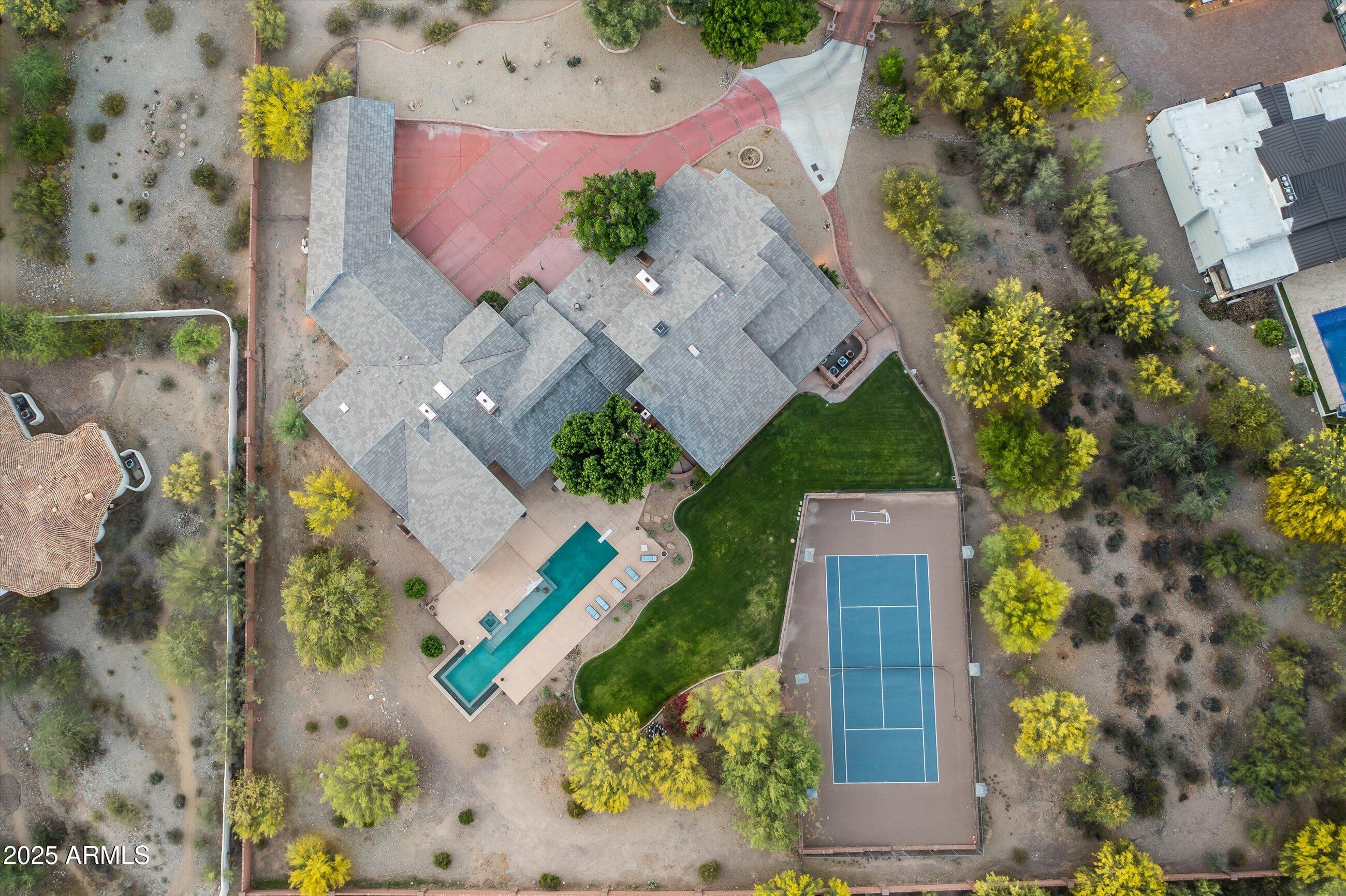 6830 North 46th Place Paradise Valley, AZ 85253 - Photo 65 of 65 an aerial view of a house with a yard