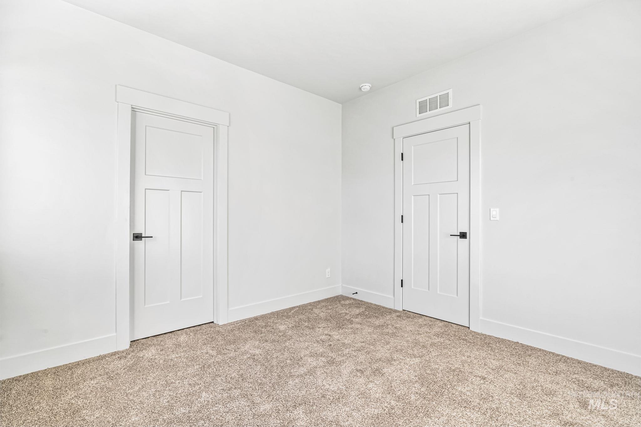 2905 Cypress Point Payette, ID 83661 - Photo 12 of 26 Spare room with carpet flooring and baseboards