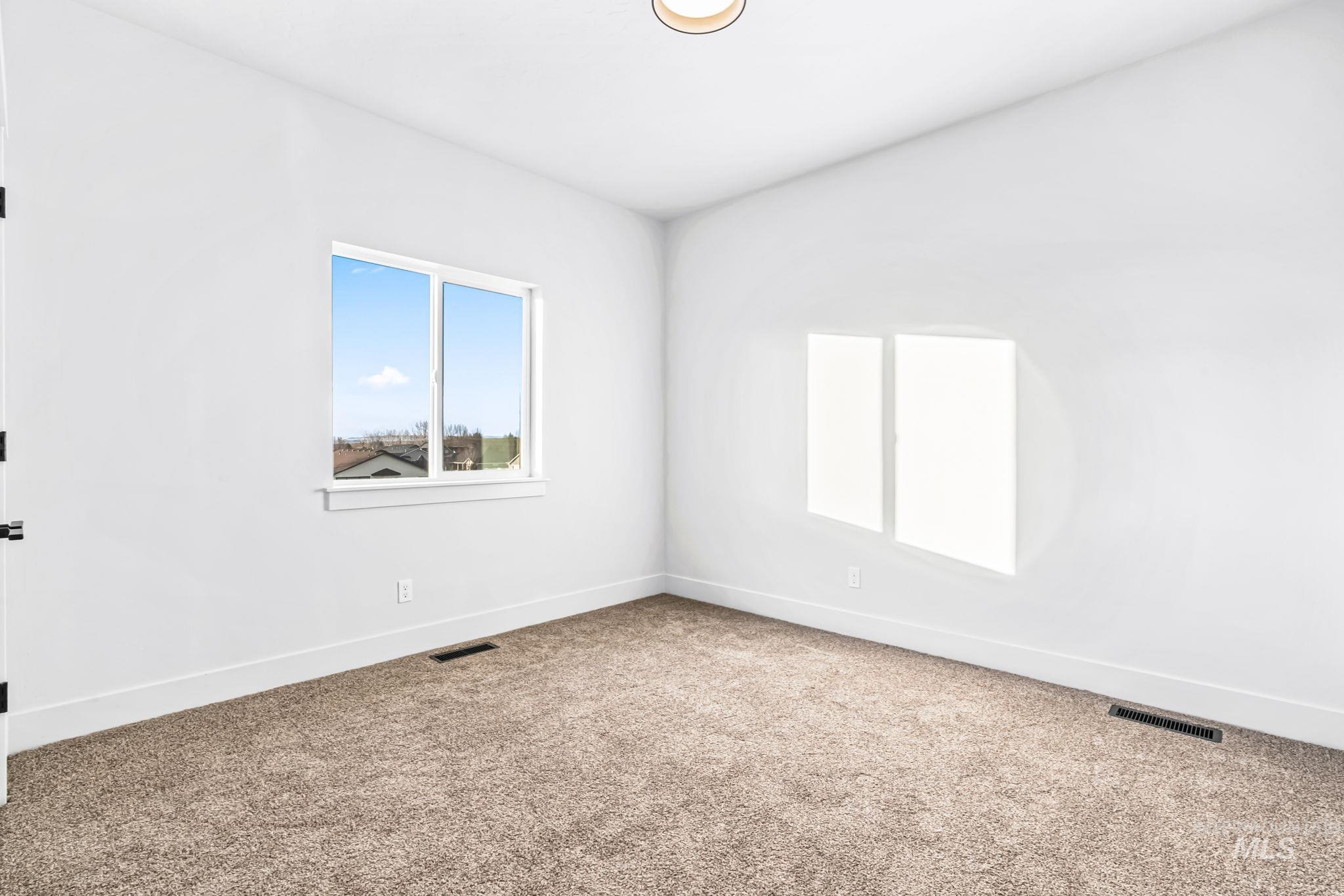 2905 Cypress Point Payette, ID 83661 - Photo 19 of 26 Spare room with carpet flooring and baseboards