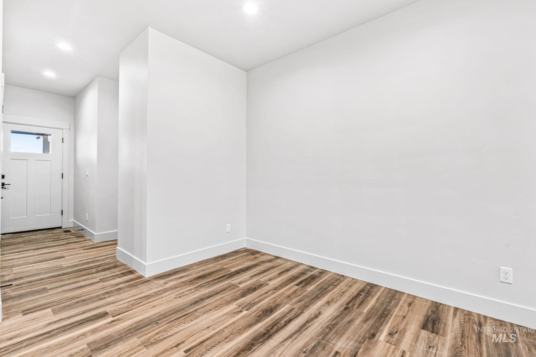 2905 Cypress Point Payette, ID 83661 - Photo 23 of 26 Unfurnished room featuring light wood-style flooring and recessed lighting