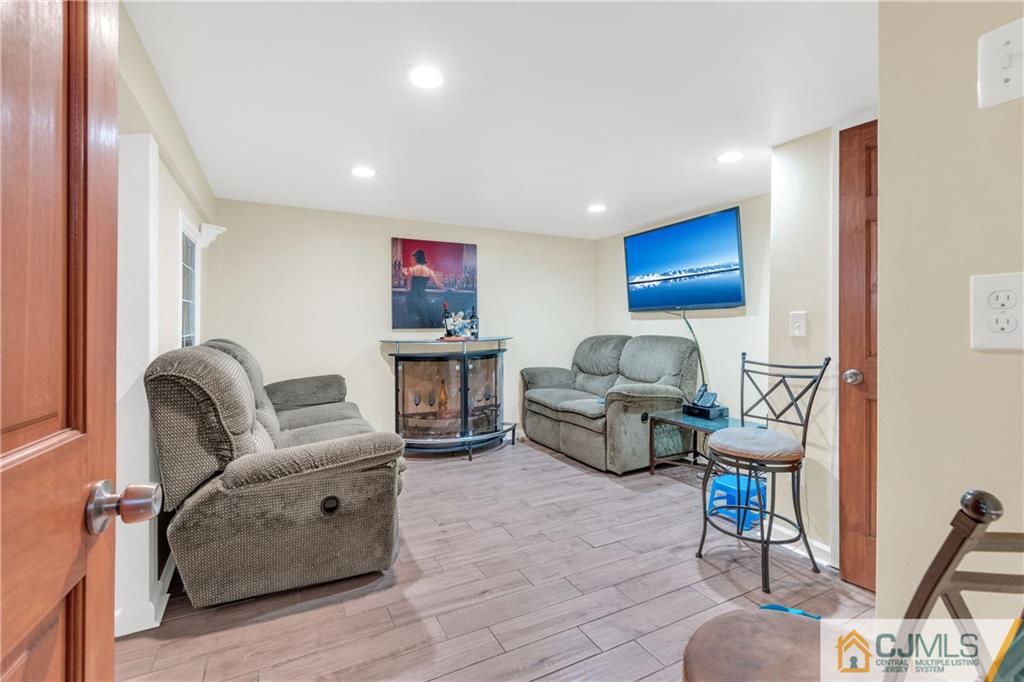 208 Oak Place Piscataway, NJ 08854 - Photo 14 of 23 a living room with furniture and a couch