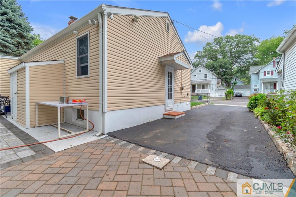 208 Oak Place Piscataway, NJ 08854 - Photo 23 of 23 a backyard of a house with basket ball court
