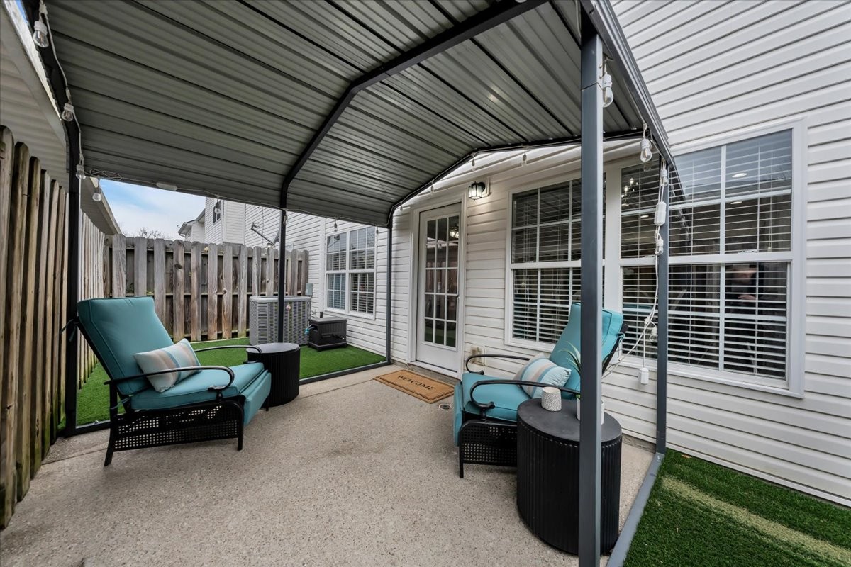 4015 Clinton Lane Spring Hill, TN 37174 - Photo 20 of 40 a view of a patio with a table and chairs