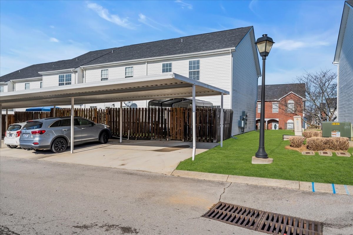 4015 Clinton Lane Spring Hill, TN 37174 - Photo 22 of 40 a view of a house with a yard and parking space