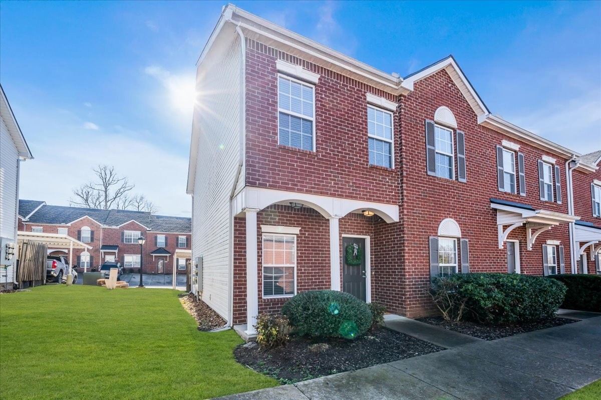 4015 Clinton Lane Spring Hill, TN 37174 - Photo 25 of 40 a front view of a building with garden