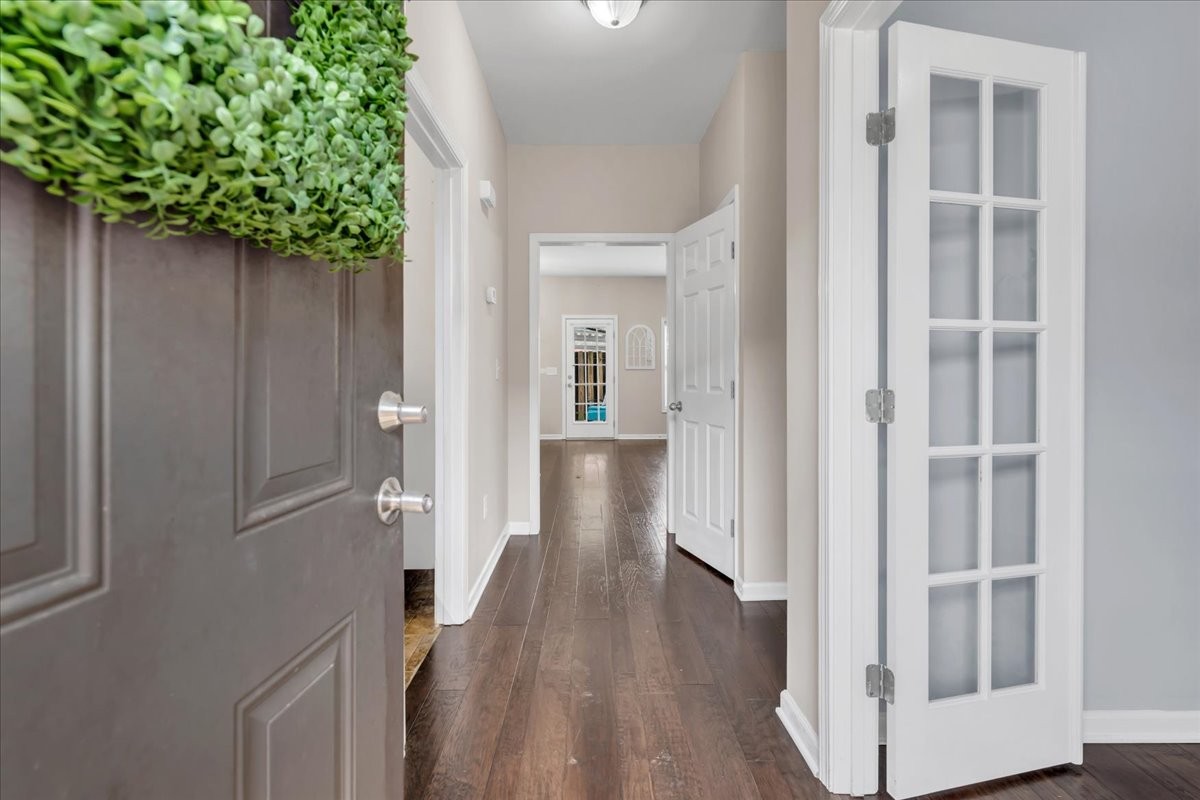 4015 Clinton Lane Spring Hill, TN 37174 - Photo 27 of 40 a view of a hallway with wooden floor and entryway