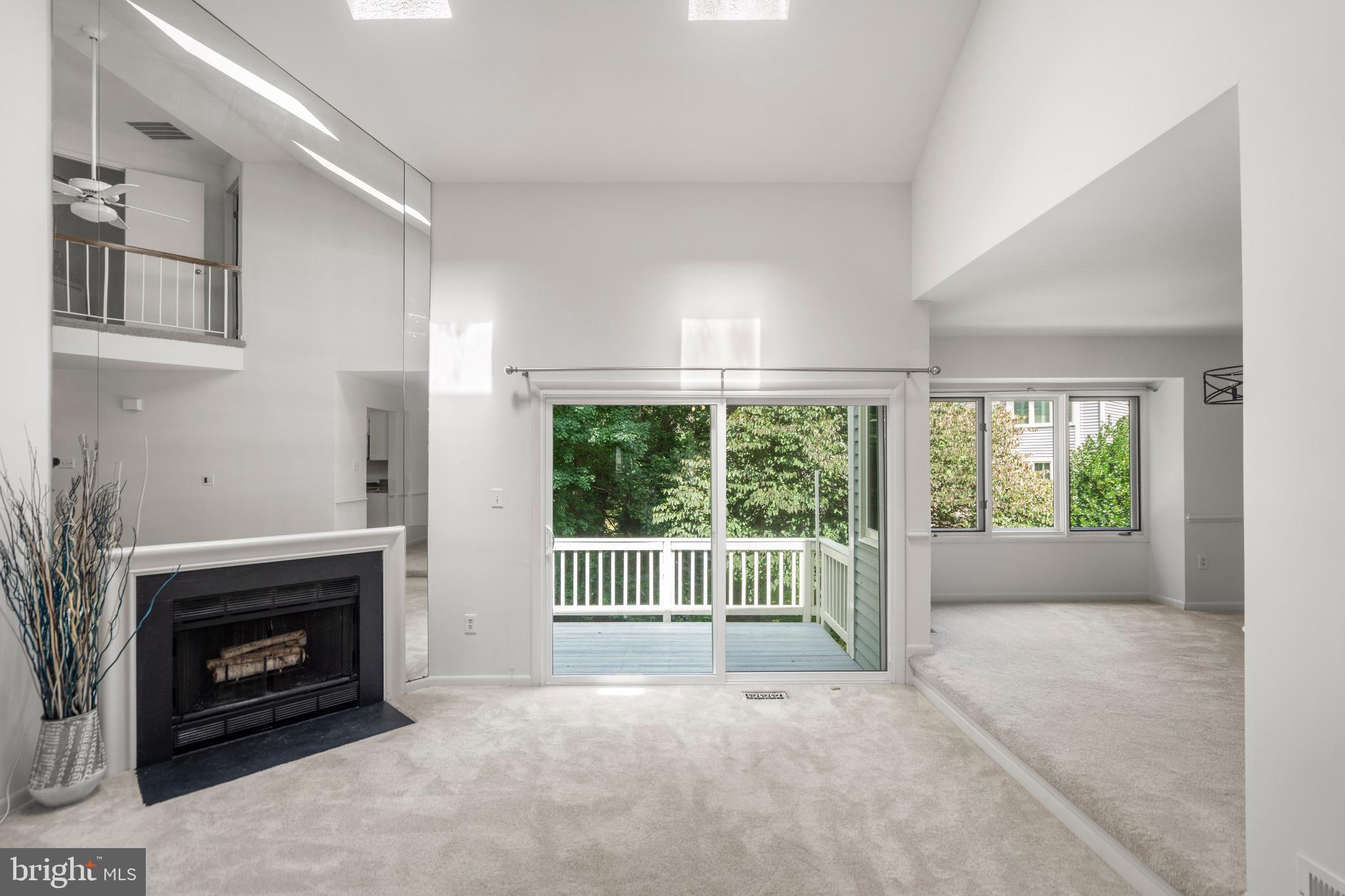 1281 Wedgewood Manor Way Reston, VA 20194 - Photo 11 of 56 Living room view to back deck