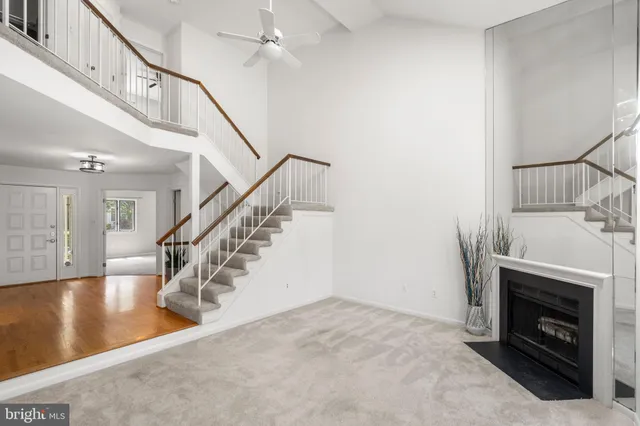a view of a livingroom with furniture and a wooden floor