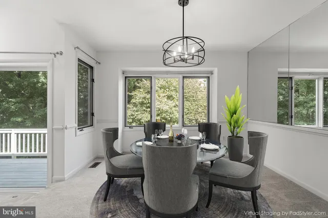 a kitchen with granite countertop a sink stove and refrigerator
