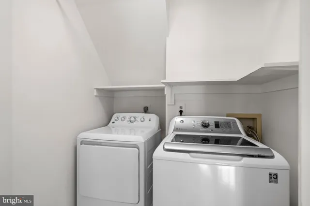 a view of balcony with wooden fence