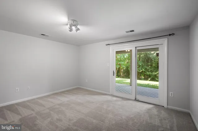 a view of balcony with wooden floor