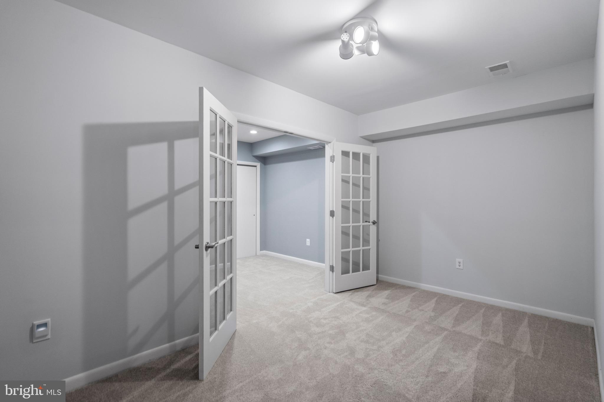 1281 Wedgewood Manor Way Reston, VA 20194 - Photo 45 of 56 View from exercise room to recreation room