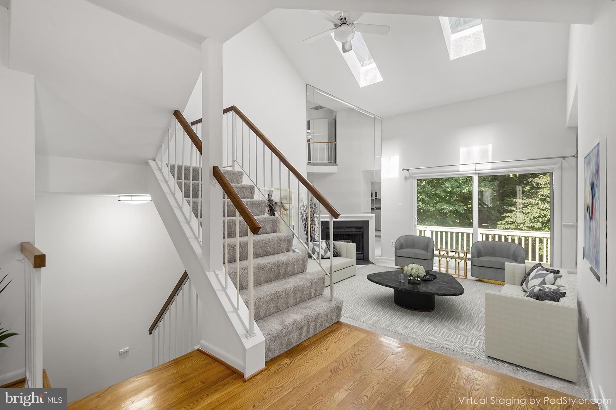 1281 Wedgewood Manor Way Reston, VA 20194 - Photo 10 of 56 Living room and dining room (virtually staged)