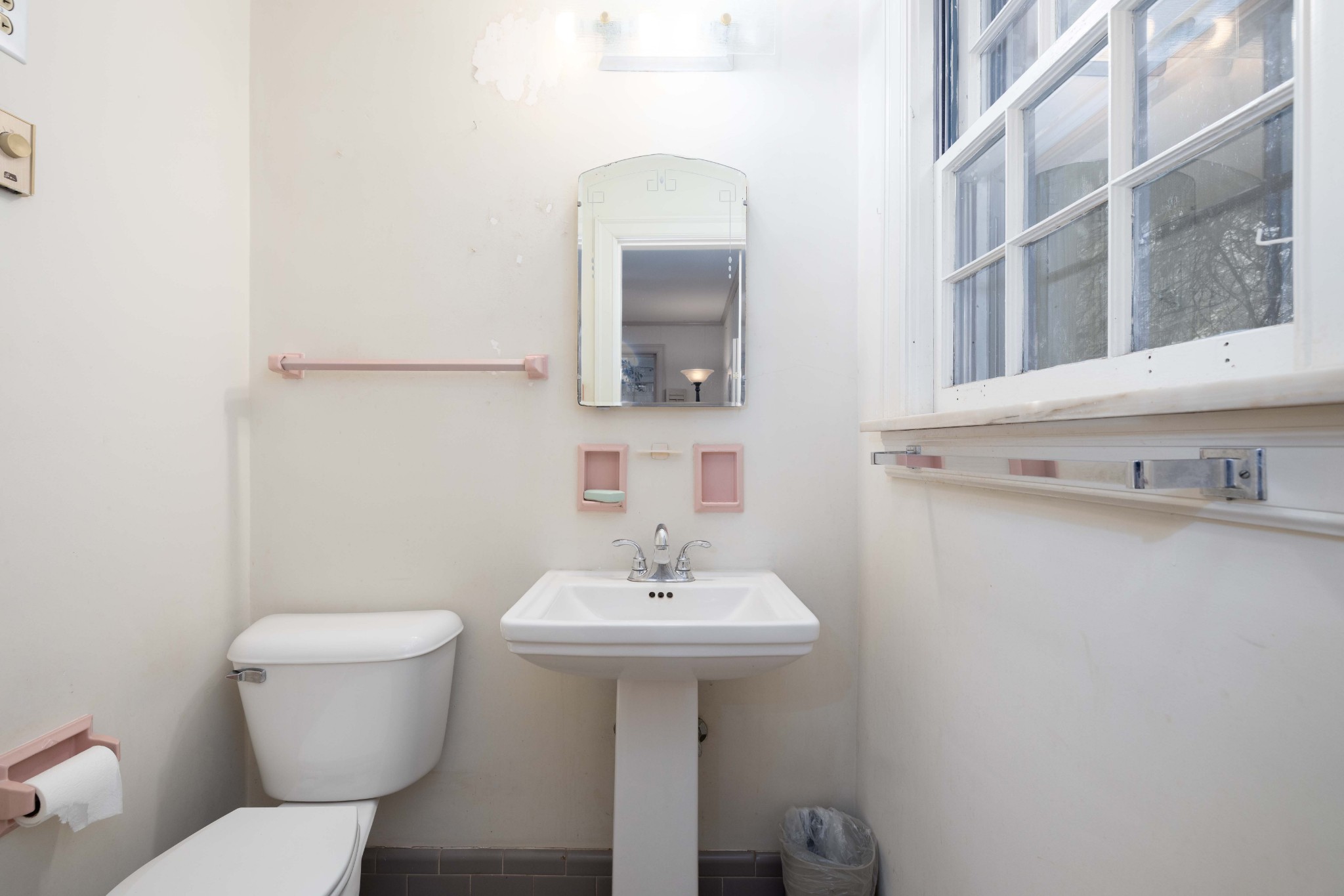714 Murfreesboro Road Franklin, TN 37064 - Photo 12 of 46 a bathroom with a sink a toilet and mirror