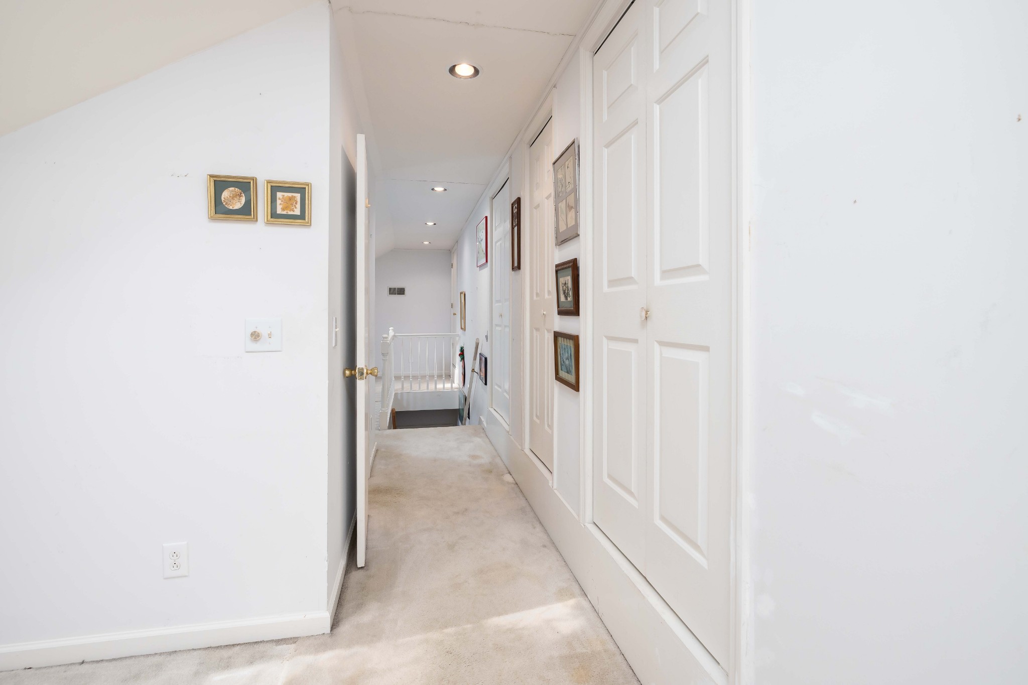 714 Murfreesboro Road Franklin, TN 37064 - Photo 20 of 46 a view of a hallway with a livingroom and a bathroom with a sink