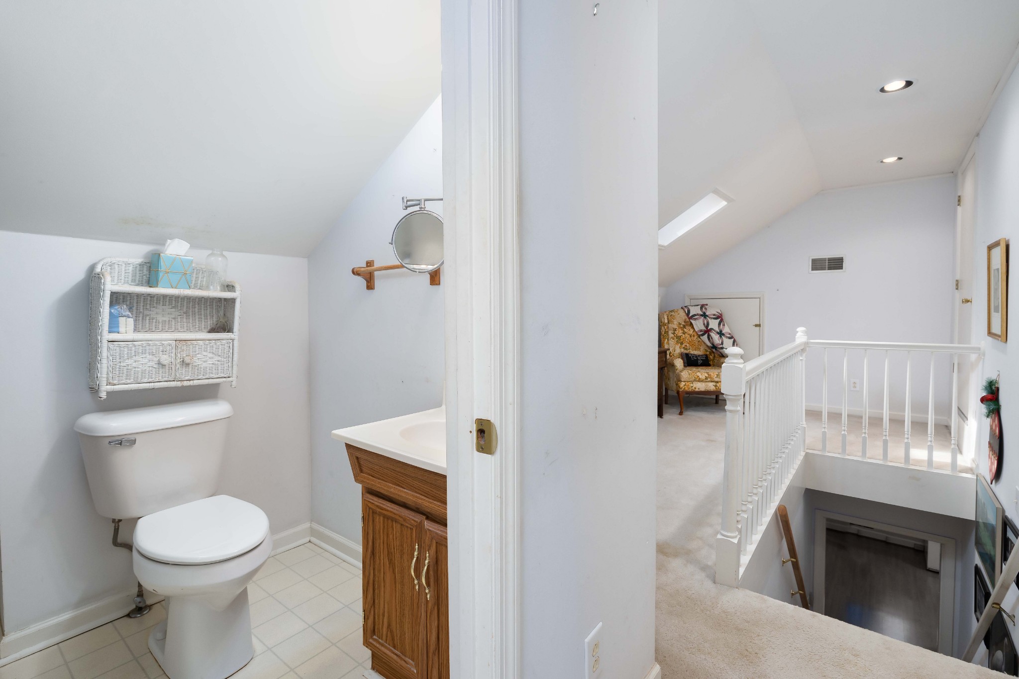 714 Murfreesboro Road Franklin, TN 37064 - Photo 22 of 46 a bathroom with a toilet a sink and a mirror