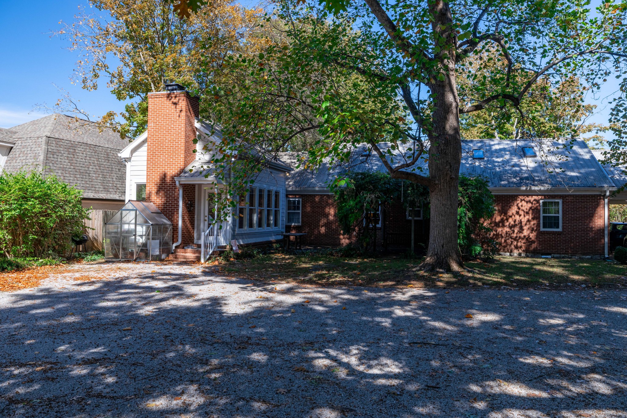 714 Murfreesboro Road Franklin, TN 37064 - Photo 25 of 46 a view of a house with a yard